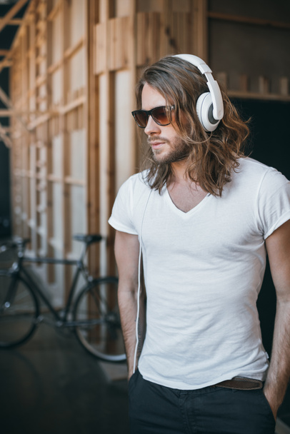 Young man in headphones  - Photo, Image