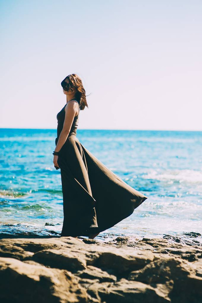 beautiful fashionable model on the beach  - Zdjęcie, obraz