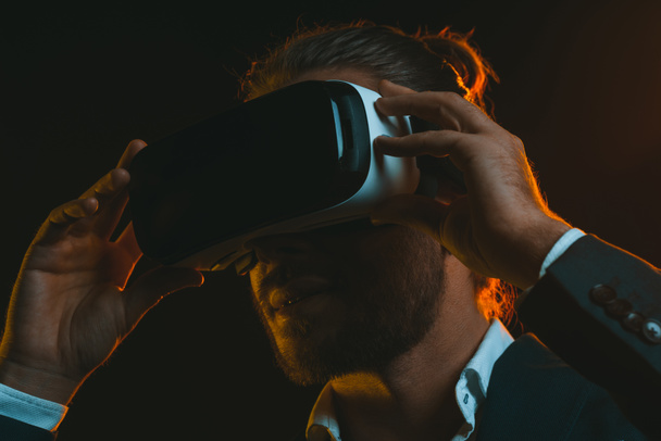 man using virtual reality headset - Photo, image