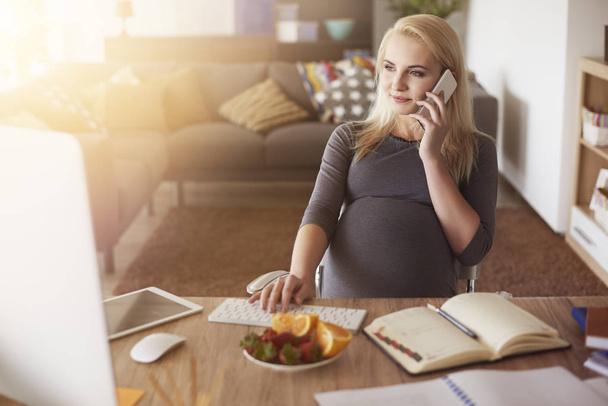 pregnant woman working - Photo, Image