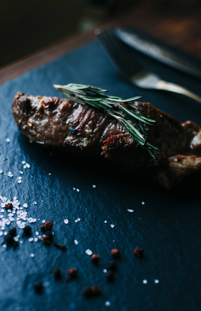 Meat steak with rosemary - Fotó, kép