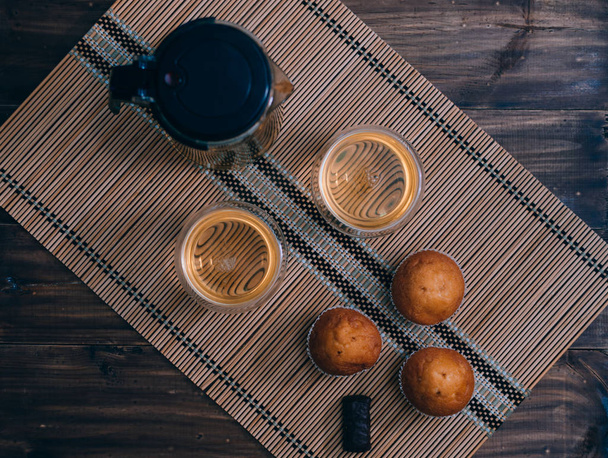 Tea And Sweet Cupcakes - Фото, зображення