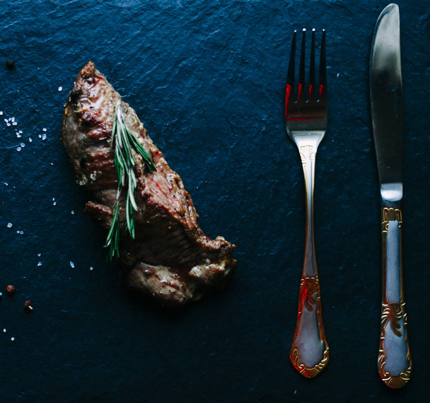 Meat steak with rosemary - Fotografie, Obrázek