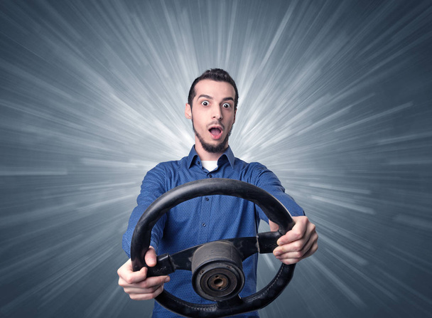 Man holding steering wheel - Foto, Imagen