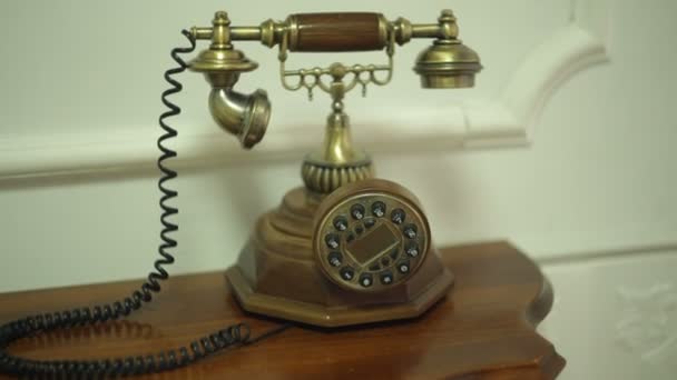 Antique vintage phone on table in hallway - Footage, Video