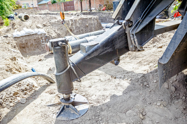 Hydraulický jeřáb noha je podporována pro bezpečnost, boční stabilizátor - Fotografie, Obrázek