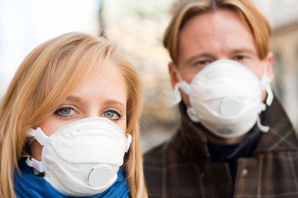 People Wearing Flu Protection Masks - 写真・画像