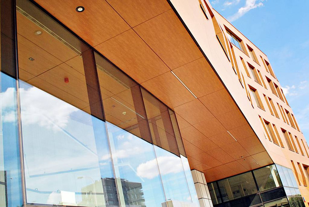 Modern building. Modern office building with facade of glass. - Фото, зображення