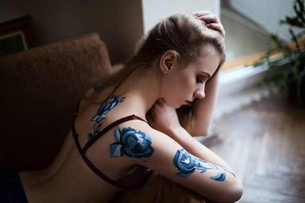 Girl in lingerie with blue roses body art painting - Fotografie, Obrázek