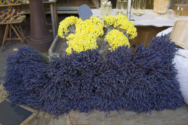 Dry lavender flowers for sale at a market in Provence, France bunch - Фото, изображение