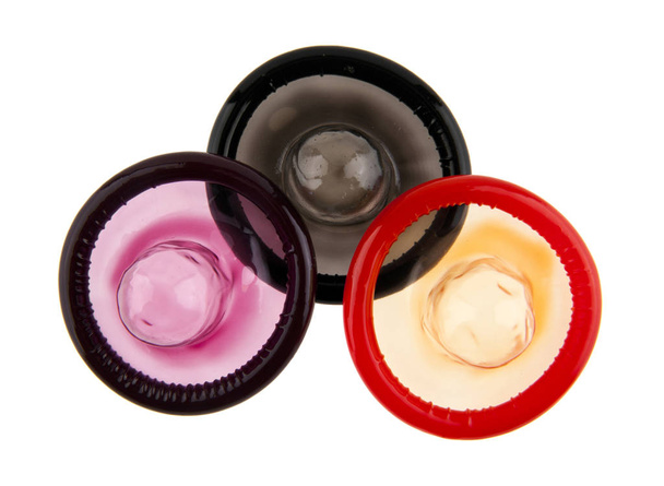 Preservativos sobre fondo blanco
 - Foto, Imagen