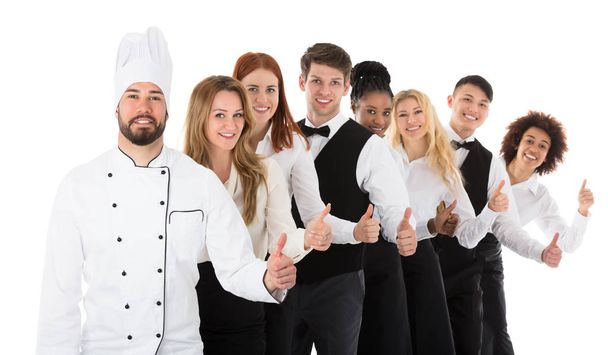 Restaurant Staff Gesturing Thumbs Up - Foto, Imagem