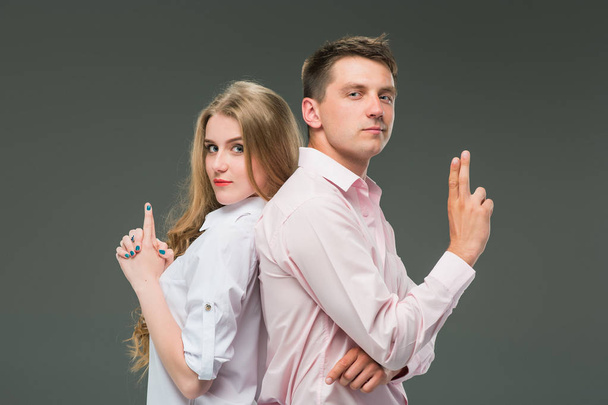 The young couple with different emotions during conflict - Foto, afbeelding