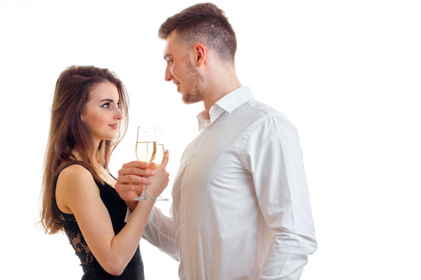 man with girl drink champagne in the Studio - Фото, зображення