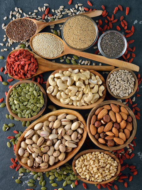 Different superfoods on a gray background - Foto, immagini