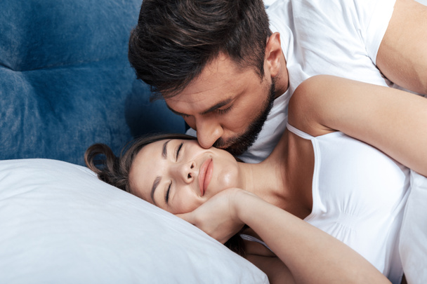 loving couple embrace in bed - Photo, Image