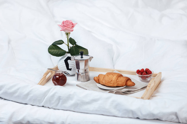 Tray with breakfast on bed - Foto, imagen