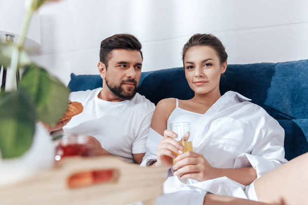 couple having breakfast in bed - Photo, Image