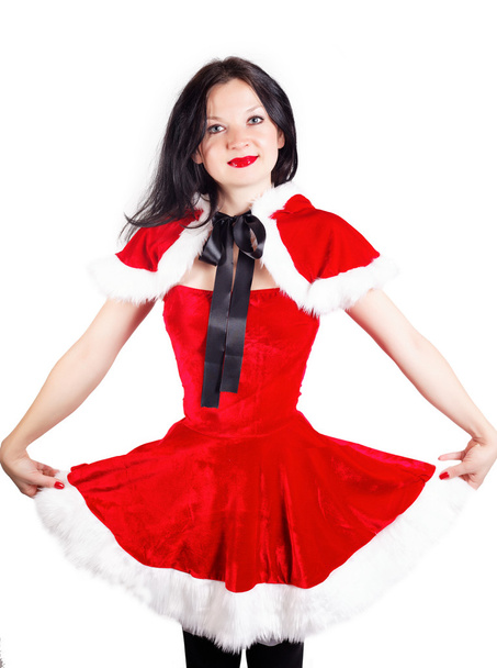 Pretty girl dressed as Santa for Christmas - Fotó, kép