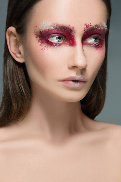 Beautiful woman face portrait close up with red make up - Valokuva, kuva