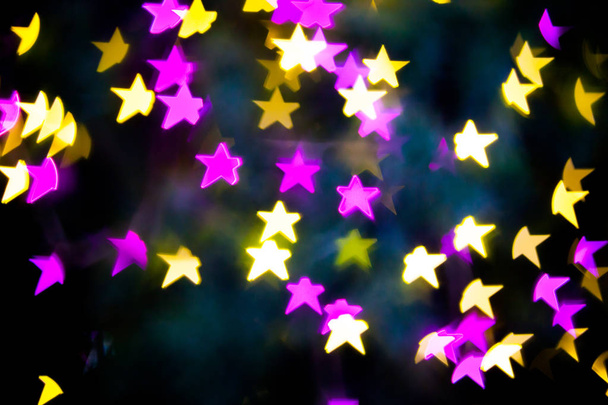 Abstraktní žluté fialové pozadí bokeh hvězda světla  - Fotografie, Obrázek