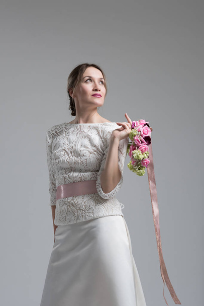 bride with a bouquet  isolated  - Foto, afbeelding