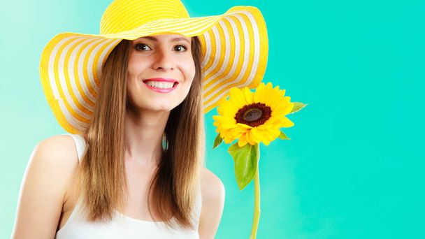 portrait attractive woman with sunflower - Фото, изображение
