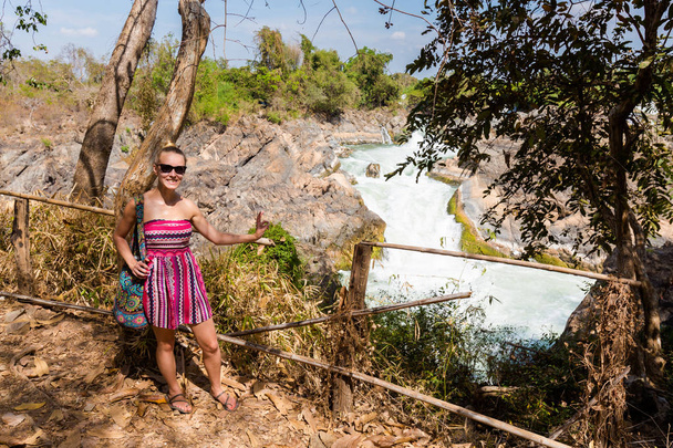 Tourist on Li Phi waterfall - Photo, Image