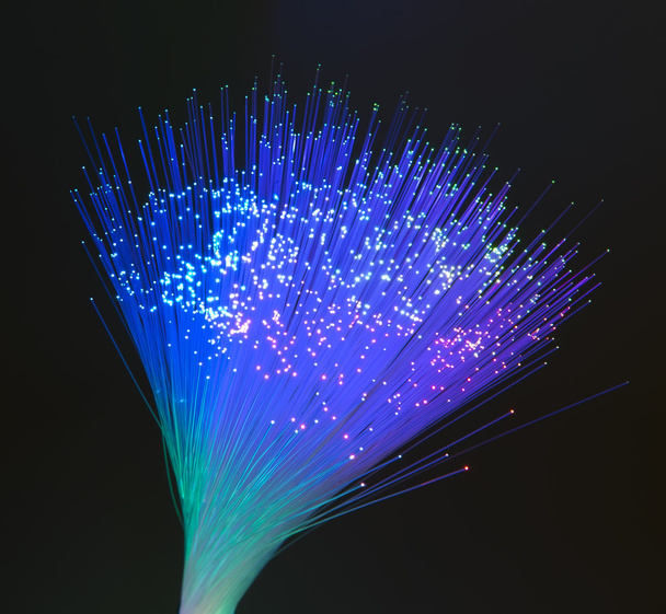 Fiber cable serve with technology style against fiber optic background - Photo, Image