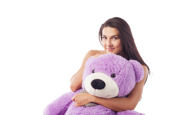 Woman with teddy on isolated - Foto, immagini