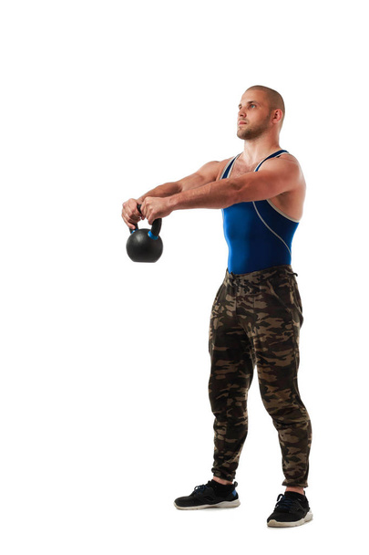 Man doing exercise with weight - Valokuva, kuva