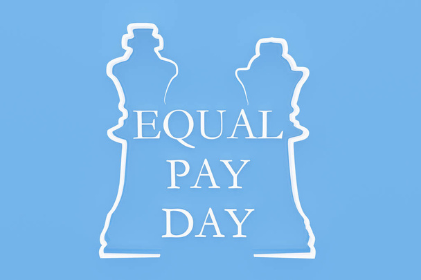 Forma de la pieza de ajedrez con texto "Día de igualdad salarial
" - Foto, Imagen
