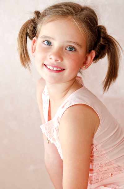 Portrait of adorable smiling little girl child  - Fotó, kép