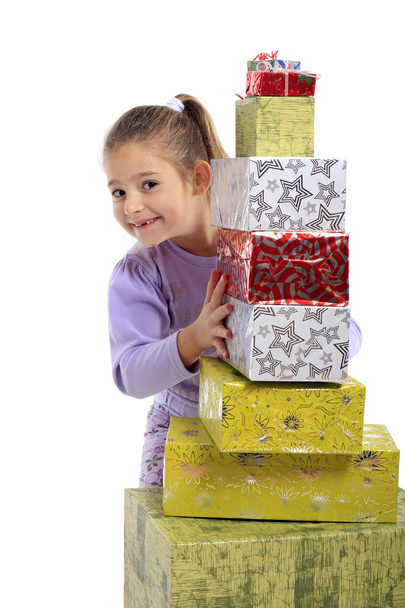 Little girl with a gift box - Фото, зображення