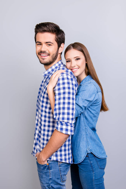 Profile photo of two young cute lovers, pretty lady is hugging g - Foto, afbeelding