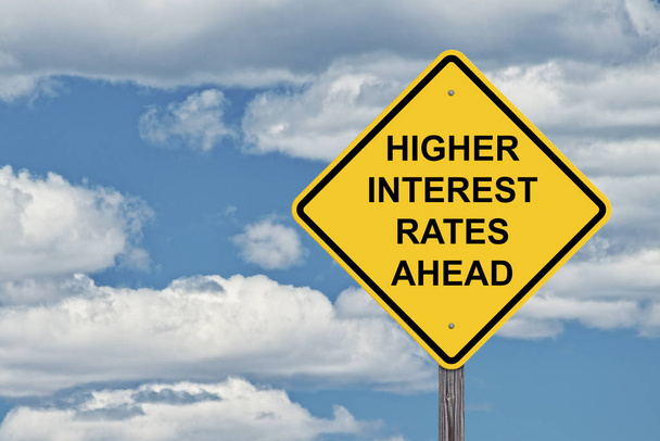 Caution Sign Blue Sky - Higher Interest Rates - Photo, Image