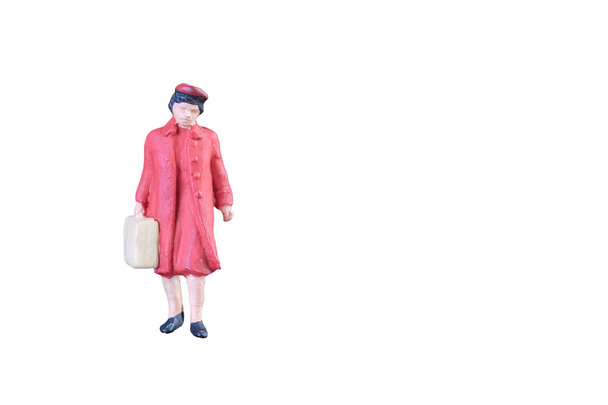Close up of Miniature people isolated with clipping path on white background. - Φωτογραφία, εικόνα