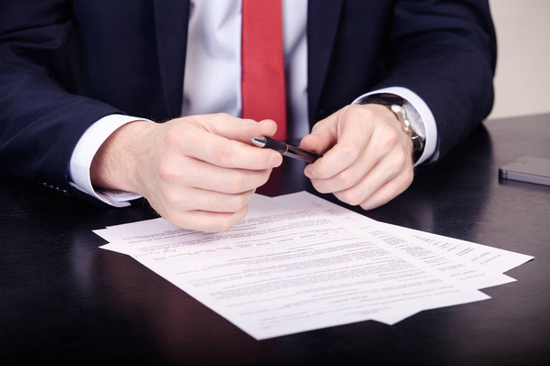 Business agreement signing, businesswoman handwriting signature on contract document at office desk - Фото, изображение