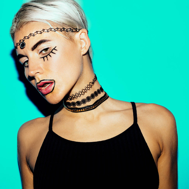 Blonde in fashion accessories. Choker and bracelets Swag fashion - 写真・画像