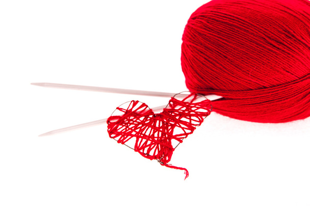 Knitting yarn with needles and a heart - Photo, Image