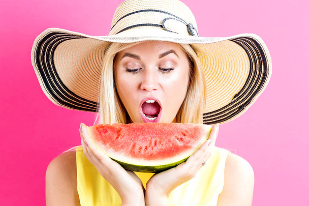 Happy young woman holding watermelon - Foto, Imagem