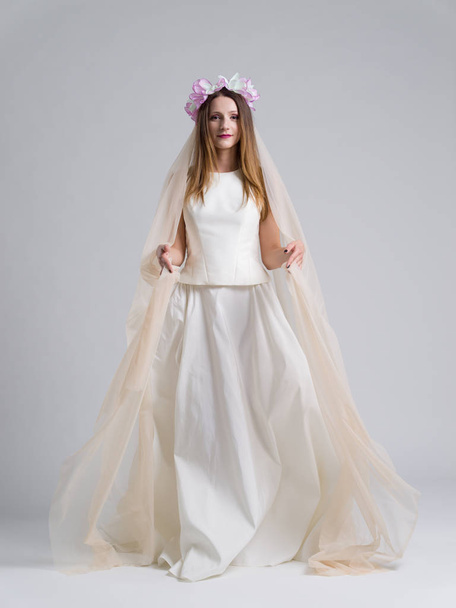 young bride in a wedding dress with a veil - Photo, Image