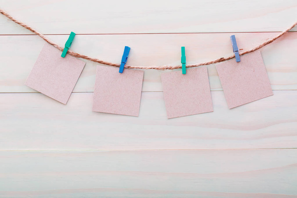 Small cards hanging with clothespins - Foto, Imagem