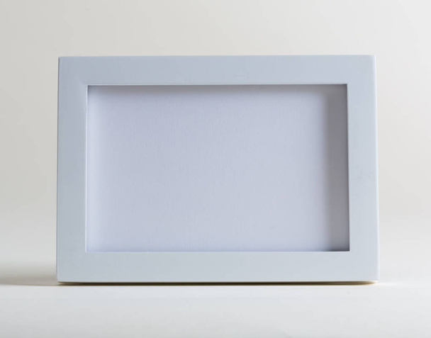 Blank white picture frame - Φωτογραφία, εικόνα