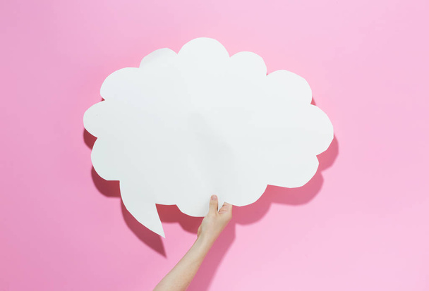 Speech bubble on a pink background - Photo, Image