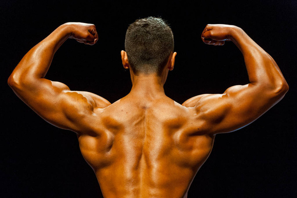 Part of body of bodybuilding athlete  - Фото, зображення