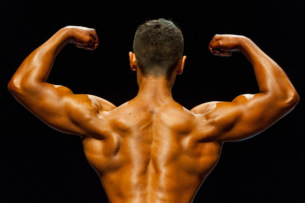 Parte del corpo dell'atleta di bodybuilding
  - Foto, immagini
