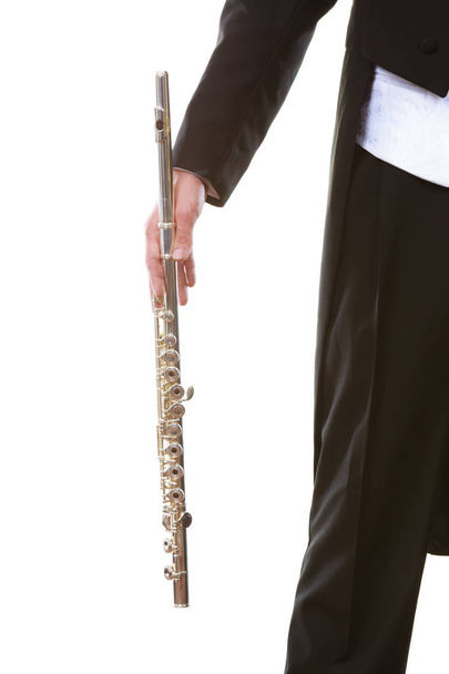 Флейтист в плаще держит флейту.
 - Фото, изображение