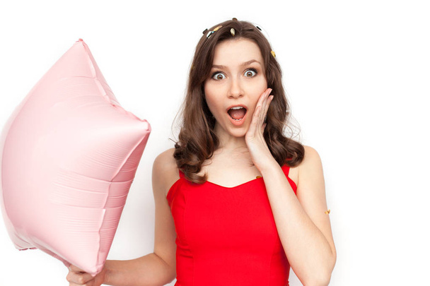 woman holding pink balloon - Fotó, kép