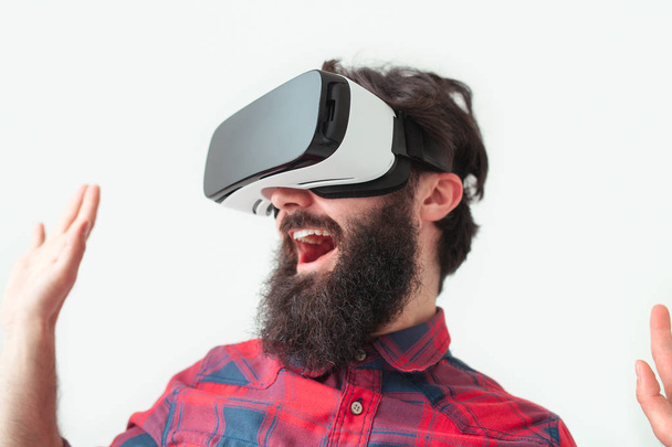 bearded man in VR goggles - Photo, image